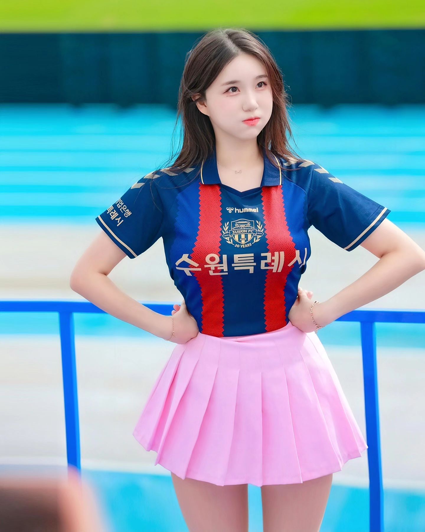 A collection of photos of Kim Hyun Young, a cheerleader model born in 2000, wearing Suwon FC uniforms